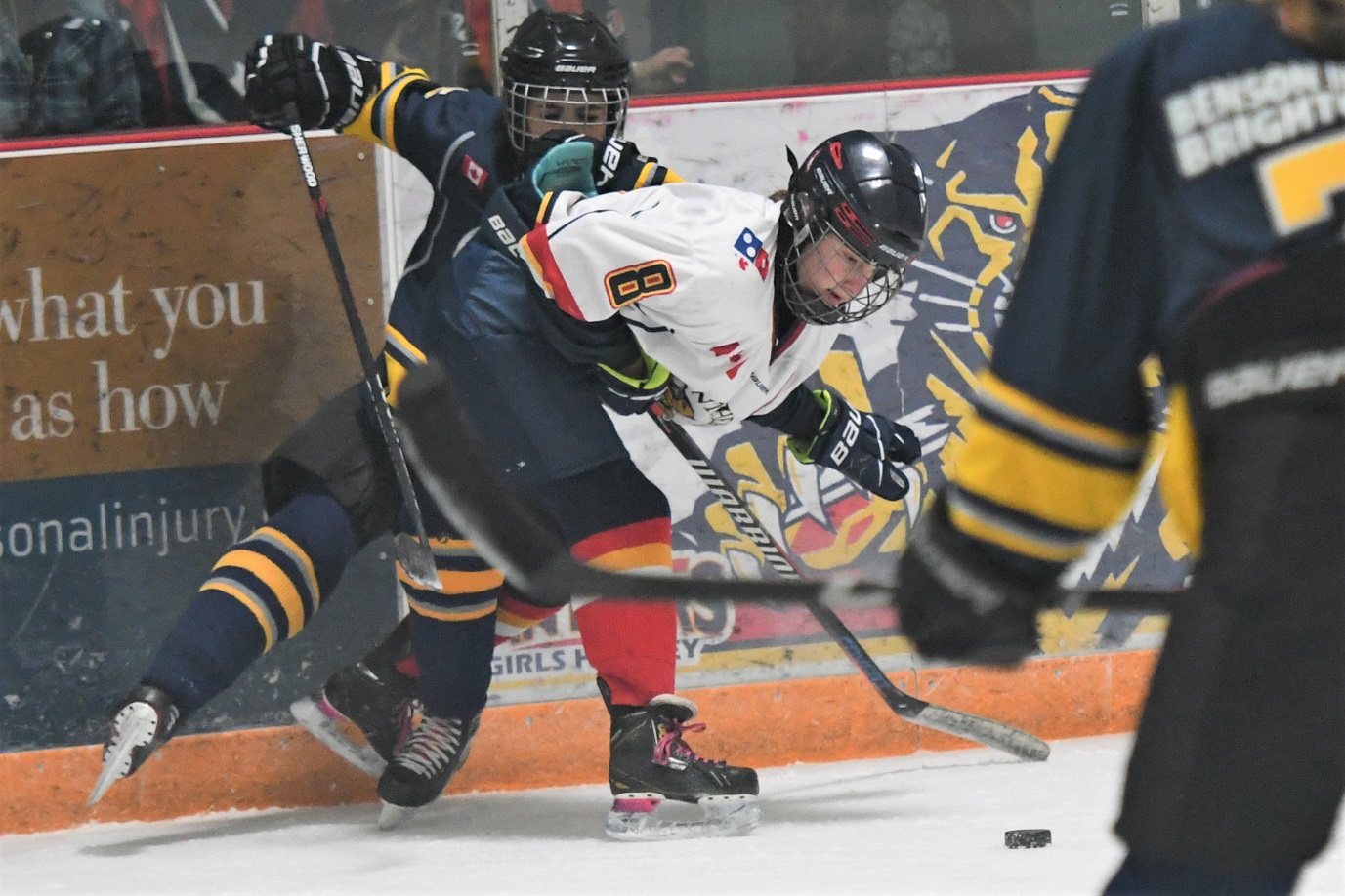 St. Thomas Panther Katelyn Fox (8) checks an Ilderton Jet pursuing the puck, during the U18 B final, at the Panthers on the Prowl hockey tournament, Sunday at the Joe  St. Thomas won 1-0.  <i> (photo / Rob J. Ross) </i> action