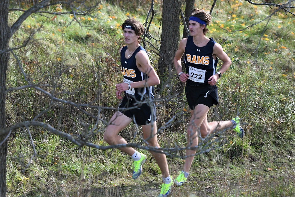 St. Joseph's Rams' Tristan (223) and Aiden Coles (222) had hoped to end their high school cross country careers at OFSAA, possibly on the podium, but had to settle for the TVRA Tricounty cross country championships. The brothers led St. Joe's to the junior boys' team title at OFSAA in 2019. <i> (photo / Rob J. Ross) </i> action